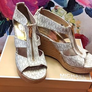Michael Kors logo wedge sandals.